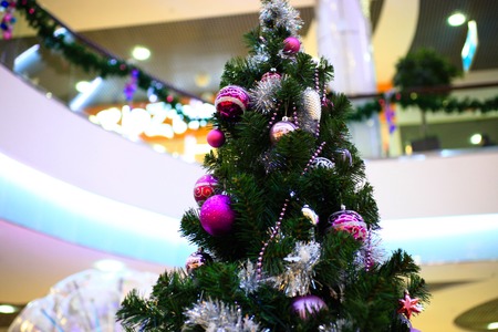 Close up of shopping mall interior decorated with christmas treeの写真素材