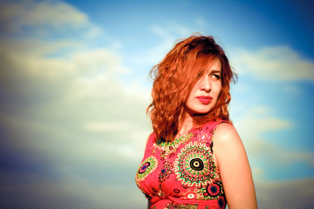 portrait of cute red haired young woman