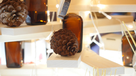 Decorative glass bottles of essential oil for aromatherapy are on spa salonの写真素材