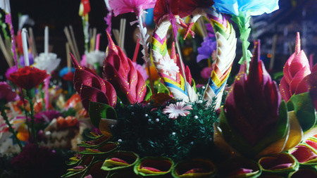 Loy Kratong Festival celebrated in Thailand. Launch boats from flowers and candles in a pondの写真素材