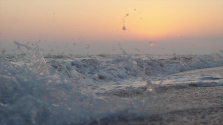 Waves at the beach in the evening