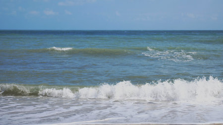 Splashes the sea on tropical beach on the island of Koh Samui