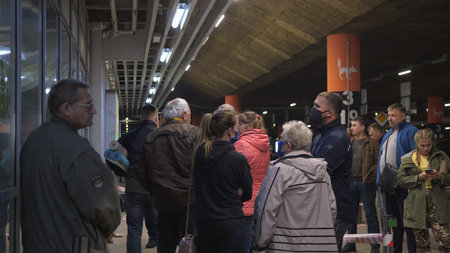 People in queue to buy goods to supermarket. Concept of Covid-19 Quarantine. Russia, Novosibirsk, 28...