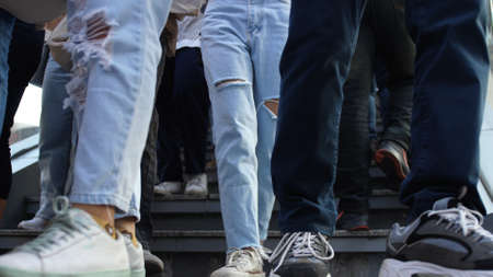 Crowd of people down and up the stairs. Close up of legs. Thailand, Bangkok, 2019のeditorial素材