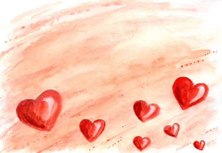 watercolor hearts in red color on pink backgroundの写真素材
