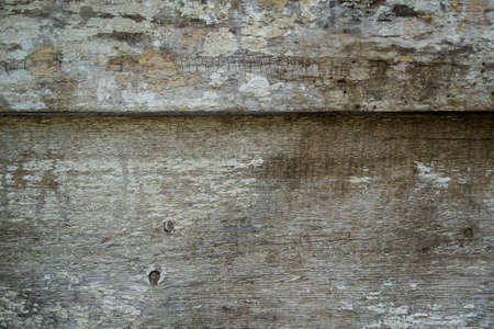 Old wood texture with scratches and cracks. Abstract background for design.の写真素材