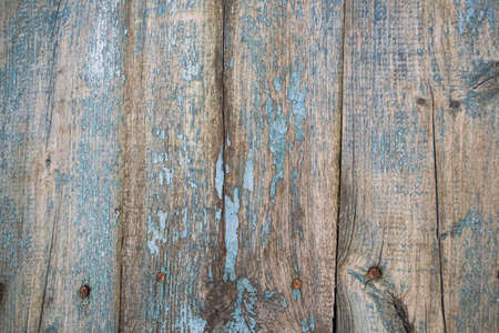 Old wooden planks with peeling paint as a background. Copy space.の写真素材