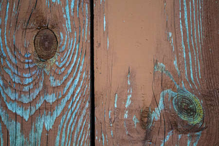 Old wooden planks with knots and nail holes. Wooden background.の写真素材