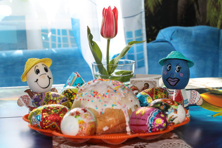 on the festive table is decorated with Easter cakes and eggs