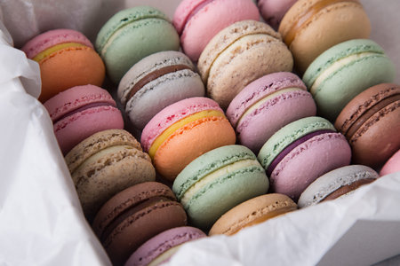Colorful macaroons of pastel colors in the box