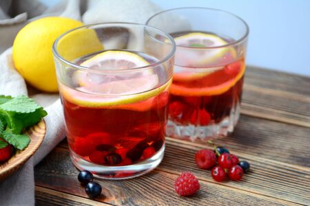 Cold berry lemonade in glasses Summer refreshing drinkの写真素材