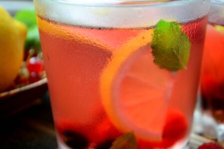 Cold berry lemonade in glasses Summer refreshing drink Close upの写真素材
