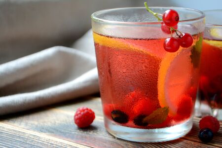 Cold berry lemonade in glasses Summer refreshing drinkの写真素材