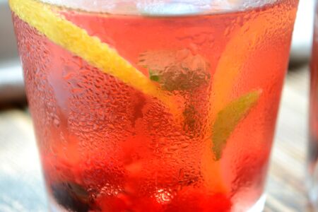 Cold berry lemonade in glasses Summer refreshing drink Close upの写真素材
