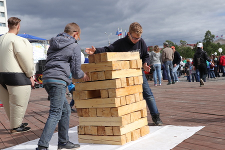 Russia, Murmansk-June 24, 2018: celebration of Russia youth Day, children play with the construction of the towerのeditorial素材