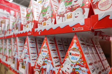 Russia, Murmansk-December 25, 2018: Kinder Christmas gift sets on supermarket Lenta shelvesのeditorial素材
