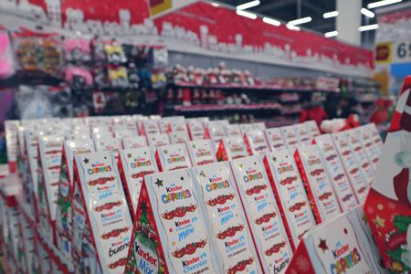 Russia, Murmansk-December 25, 2018: Kinder Christmas gift sets on supermarket Lenta shelvesのeditorial素材