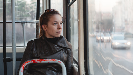 Woman riding in a busの写真素材