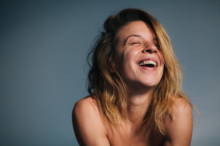 Portrait of beautiful young woman laughing