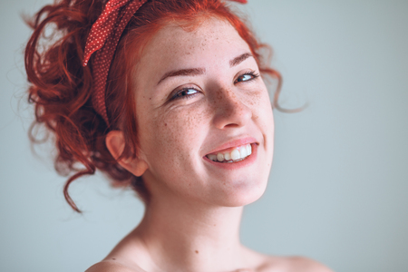 Portrait of beautiful young woman laughingの写真素材