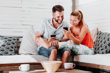 Couple relaxing in the living roomの写真素材