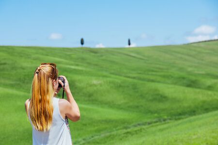 Young woman traveling through Tuscany, Italyの写真素材