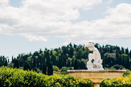 Fountain in public park garden in Florence, Italyの写真素材