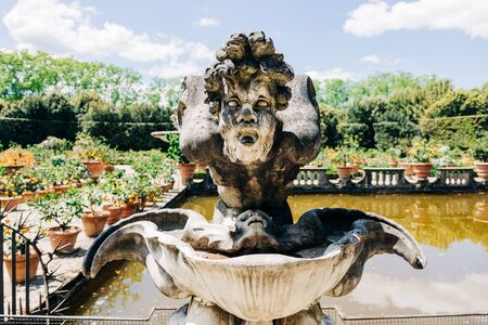 Fountain in public park garden in Florence, Italyの写真素材