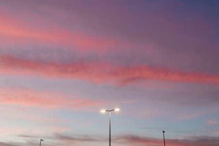 View of the streetlight in a beautiful sunset skyの写真素材