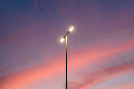 View of the streetlight in a beautiful sunset skyの写真素材