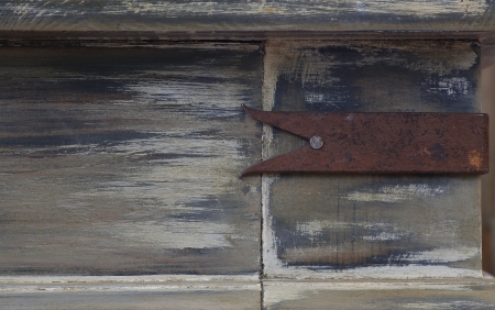 Shabby chic background with rusty ornament part of old tableの写真素材