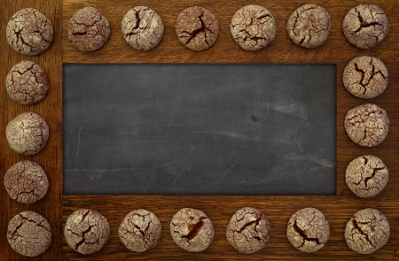 Blank Blackboard, Empty Chalkboard wooden frame and chocolate cookiesの写真素材