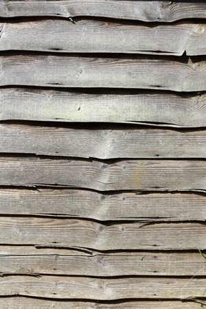 Weathered wooden fence panels background texture boards wallの写真素材
