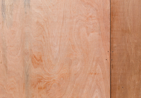 Board up windows with wooden plates decorative woodgrain veneer natural backgroundの写真素材