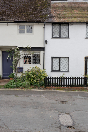 Winslow, Buckinghamshire, United Kingdom, October 25, 2016: Two cottages with tiny front gardens on the Bell Walk, Winslow.のeditorial素材