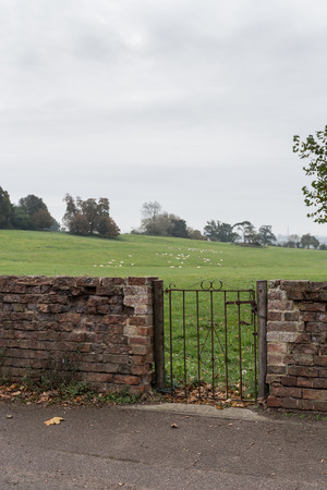 Winslow, Buckinghamshire, United Kingdom, October 25, 2016: Winslow Show showground with entrance from pavement on A413 on grey chilly morning.のeditorial素材