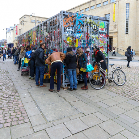 Broad Street, Oxford, UK, 27th November 2016: Art installation by Jimmy CautyÊ¼s Aftermath Dislocation Principle (The ADP), 40 ft shipping container containing a model of monumental post-riot landscape in miniature viewed through observation ports in the のeditorial素材