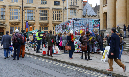 Broad Street, Oxford, UK, 27th November 2016: Art installation by Jimmy CautyÊ¼s Aftermath Dislocation Principle (The ADP), 40 ft shipping container containing a model of monumental post-riot landscape in miniature viewed through observation ports in the のeditorial素材