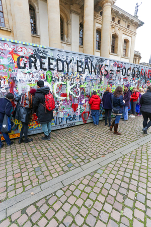 Broad Street, Oxford, UK, 27th November 2016: Art installation by Jimmy CautyÊ¼s Aftermath Dislocation Principle (The ADP), 40 ft shipping container containing a model of monumental post-riot landscape in miniature viewed through observation ports in the のeditorial素材