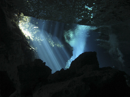 Reflection of light - Underwater at cenote Chac Mool in the Riviera Maya, Mexico.の写真素材