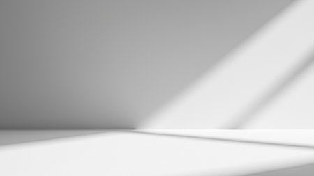 Geometric Play of Light and Shadow on White Studio Backgroundの写真素材