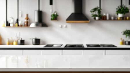 Blurred Kitchen with Stove and Shelves and Empty Countertop for Product Assemblyの写真素材