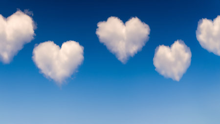 Fluffy Heart-Shaped Clouds in Blue Sky with Copy Space for Bannerの写真素材