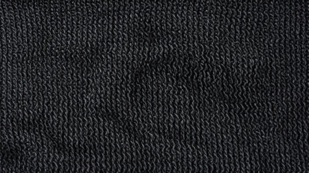 Black Knitted Fabric Texture, Soft Warm Textile with Draperiesの写真素材