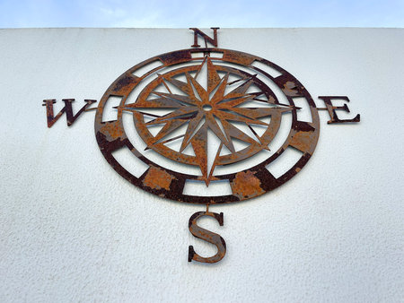 Front Below View of Rusted Compass Rose Wall Decor