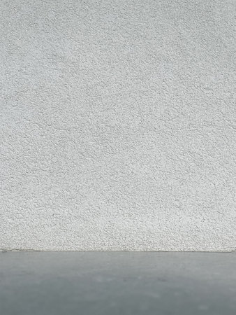 Vertical Empty Neutral Textured Room Wall and Floor Background for Product Mockupの写真素材