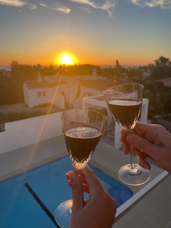 Cheers with Port Wine at Sunset, Carvoeiro, Algarve, Portugal, Focus on Foreground