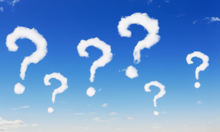 Question Mark - Shaped Clouds in Clear Blue Skyの写真素材