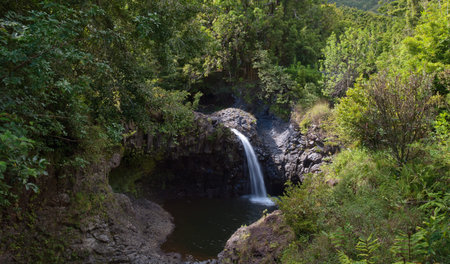A beautiful tiered waterfall found on the road to Hana - Maui, Hawaii の写真素材