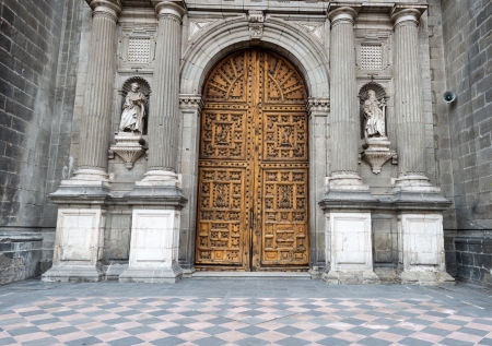 Wooden entrance doors to The Metropolitan Cathedral of the Assumption of Mary of Mexico City  It  is the oldest and largest cathedral in the Americas and seat of the Roman Catholic Archdiocese of Mexico  の写真素材